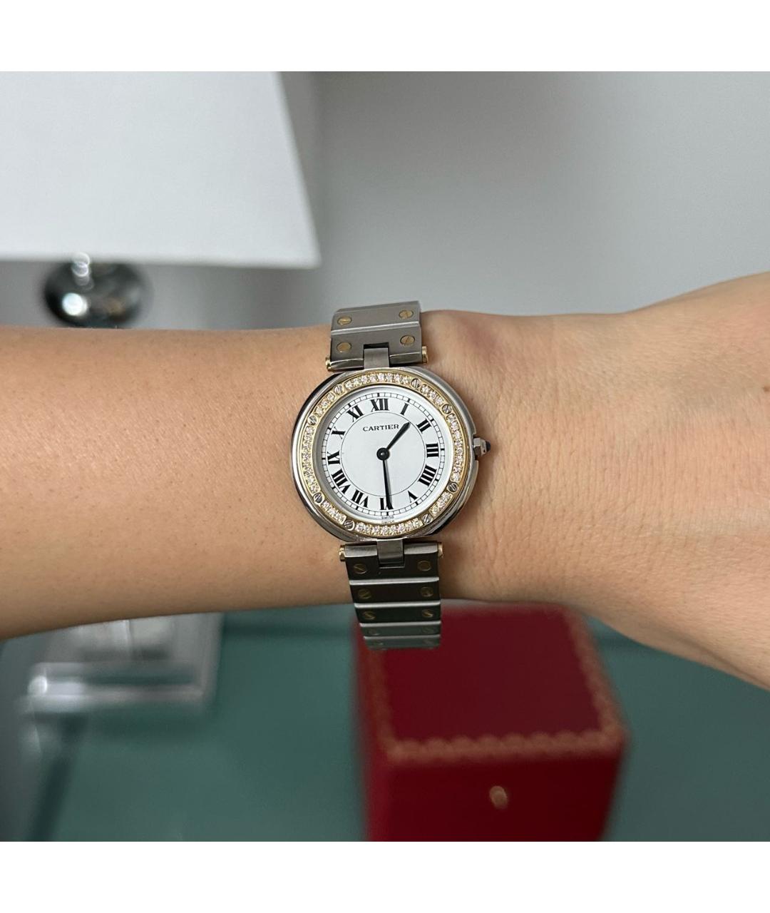 Montre  Cartier Santos Ronde
Très bon état
Argenté, Or et acier