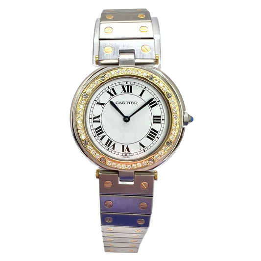 Montre  Cartier Santos Ronde
Très bon état
Argenté, Or et acier