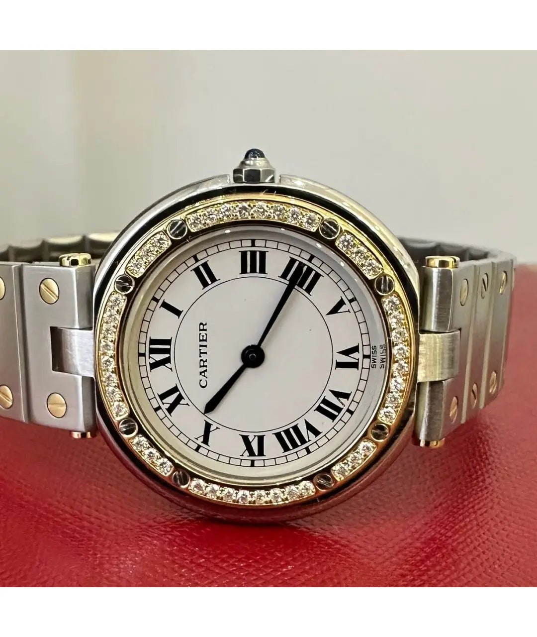 Montre  Cartier Santos Ronde
Très bon état
Argenté, Or et acier