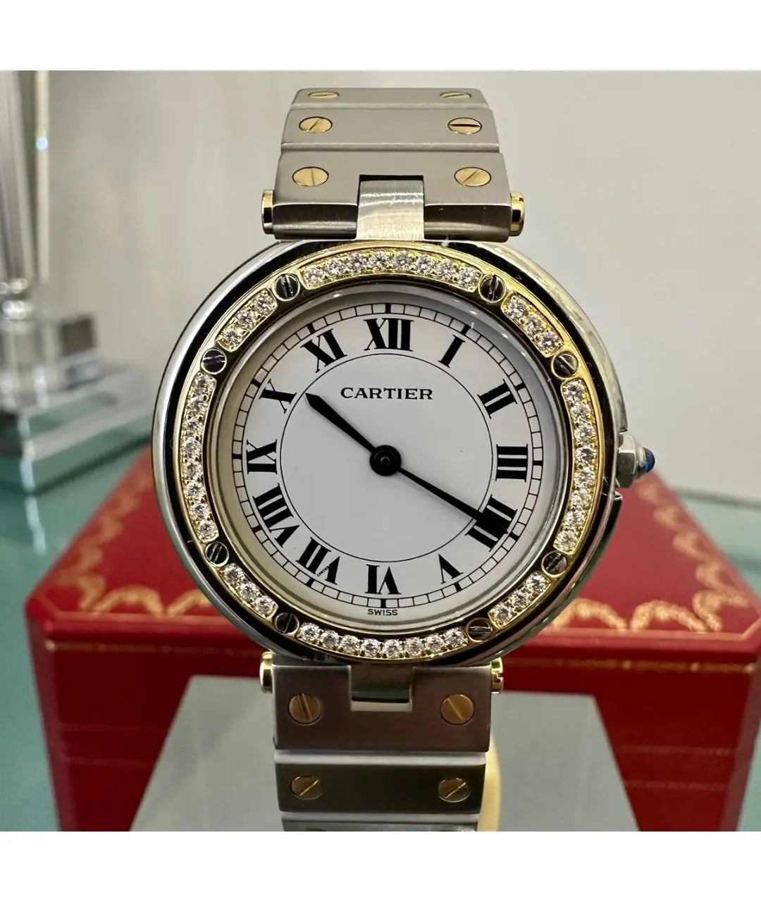 Montre  Cartier Santos Ronde
Très bon état
Argenté, Or et acier