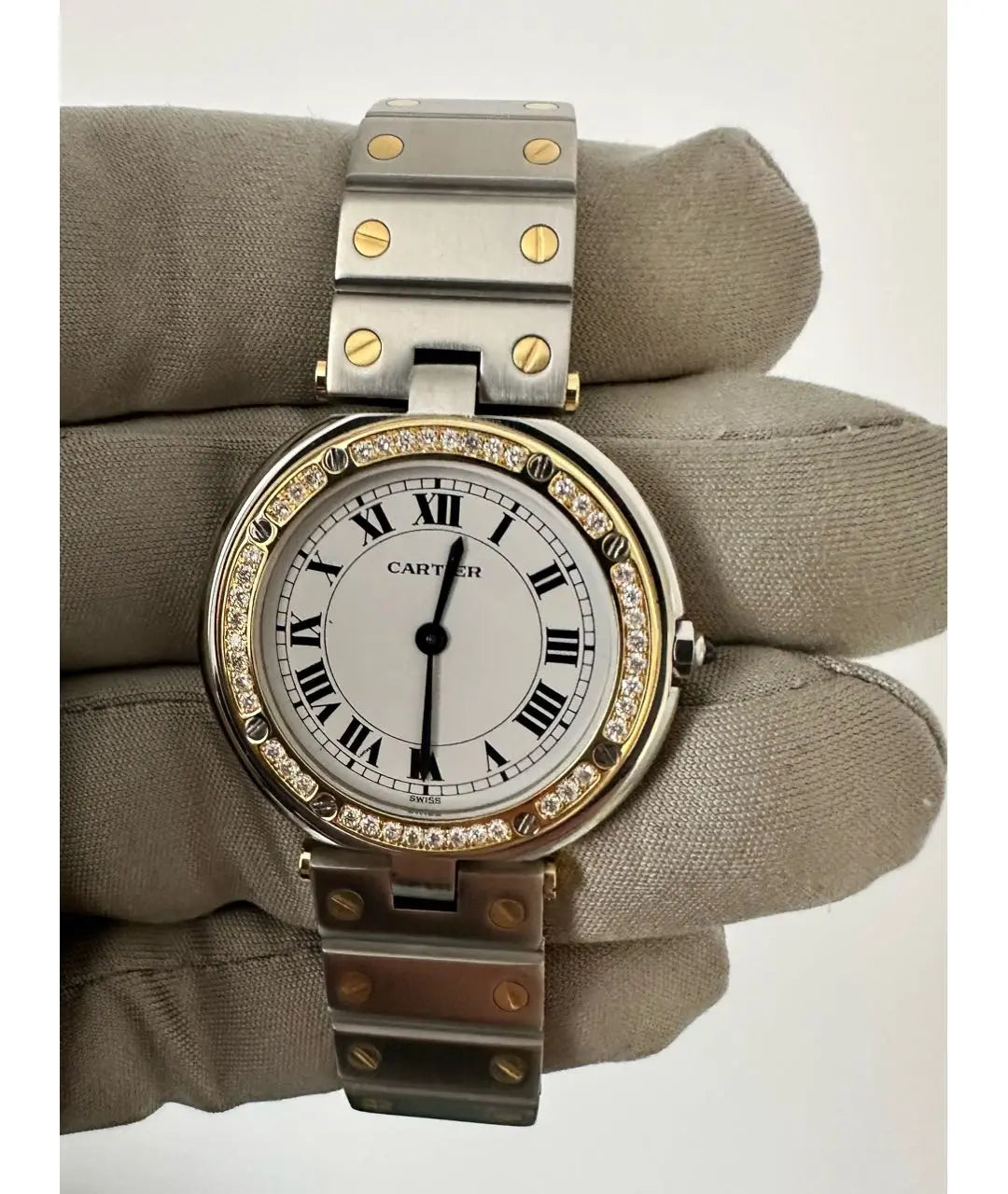 Montre  Cartier Santos Ronde
Très bon état
Argenté, Or et acier
